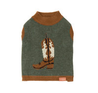 Green dog sweater with brown collar and cowboy boot design on a white background