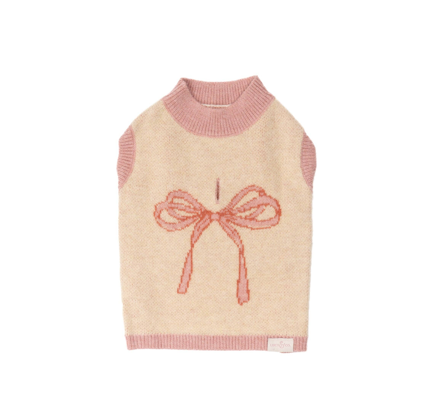 Beige sweater with pink trim and bow design on a white background