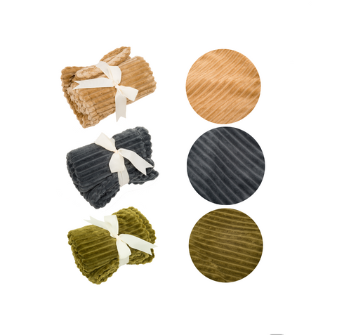 Three folded blankets in brown, gray, and green with ribbed textures on a white background.