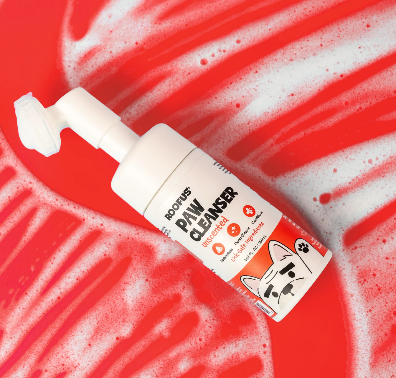 Roofus Foaming Paw Cleanser bottle showing built-in soft brush applicator and no-rinse formula details.