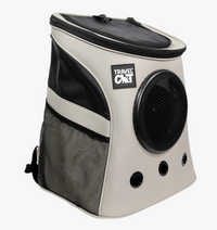 Travel Cat Fat Cat backpack shown from side angle displaying spacious interior compartment and mesh ventilation panels.