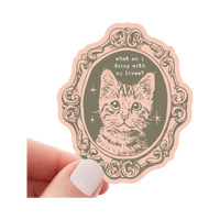Yarnival What Am I Doing With My Lives cat-themed sticker featuring playful illustrated text design.