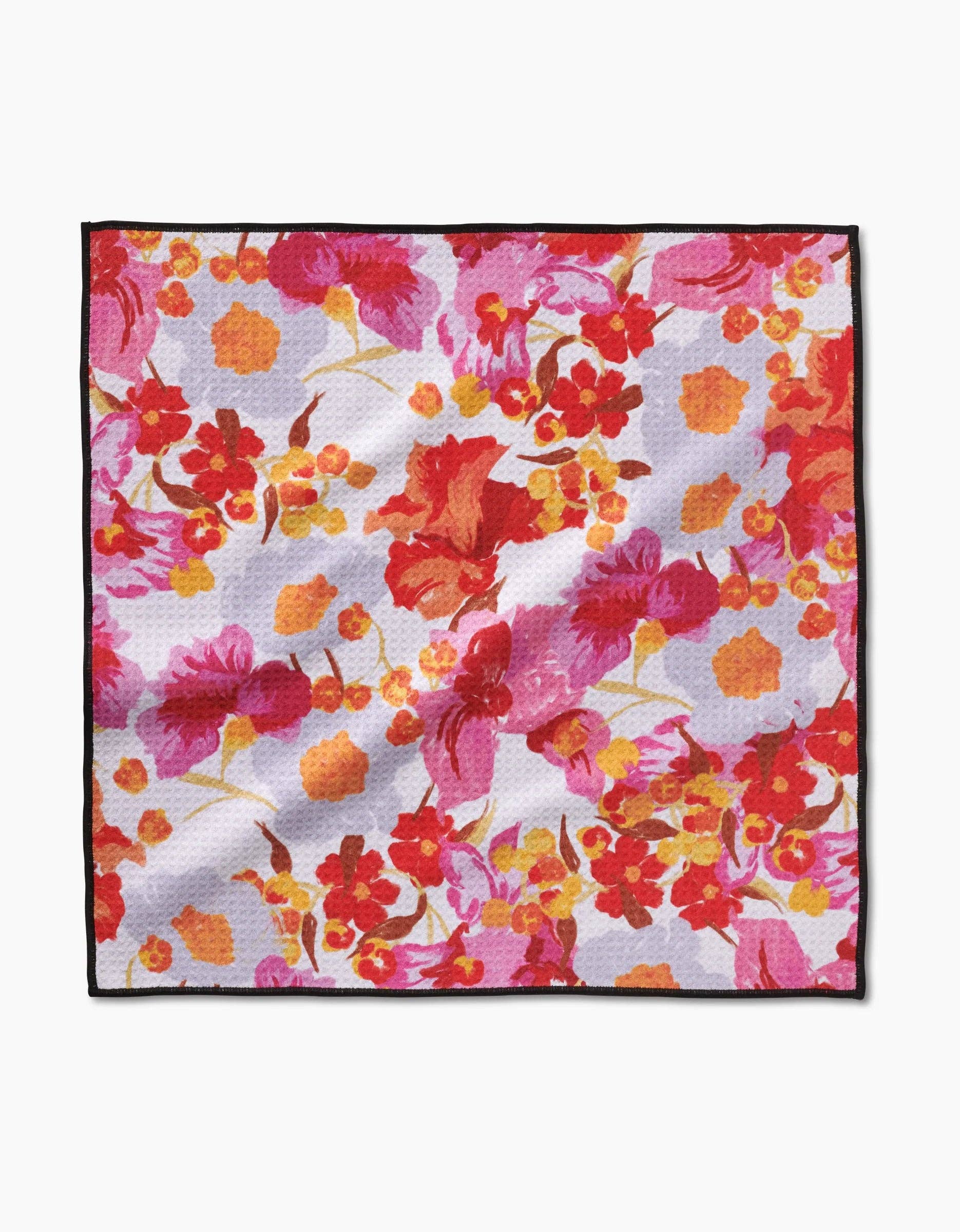 Geometry Pup Florals Paw Towel featuring colorful floral pattern on absorbent fabric for dog paw cleaning.