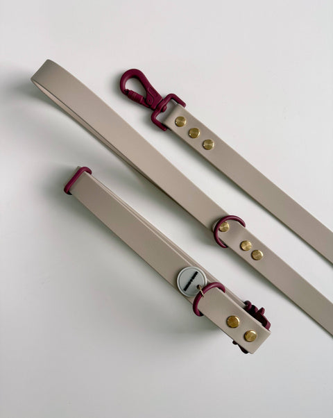 Close-up detail of Hund & Shore Vanilla Latte Waterproof Collar showing creamy beige and burgundy color pattern.