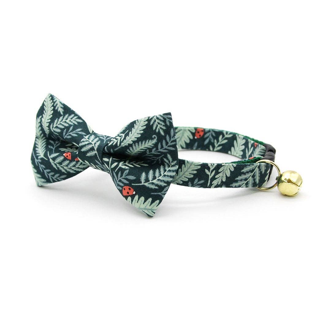 Made By Cleo Eden green cat collar showing detailed view of breakaway safety buckle mechanism.