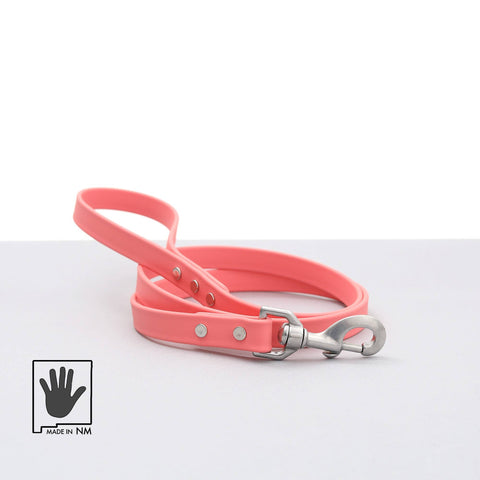 Mimi Green bright pink dog collar and leash set showing detailed hardware and waterproof construction features.