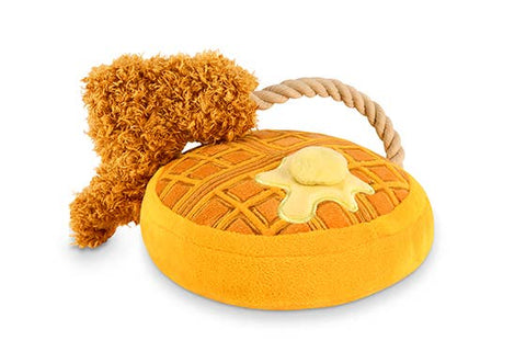 P.L.A.Y. Chicken & Woofles plush dog toy featuring golden waffle with white chicken drumstick and syrup details.