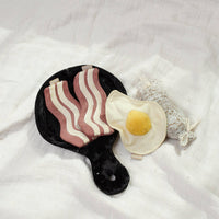 Lambwolf Collective Bfast Set snuffle toy showing textured fabric details and interactive feeding compartments for dogs.