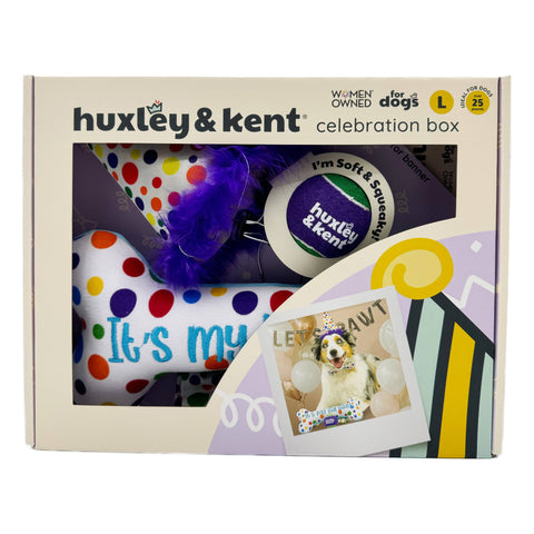 Huxley & Kent Happy Barkday Celebration Box with colorful party decorations and dog toys for birthday celebrations.