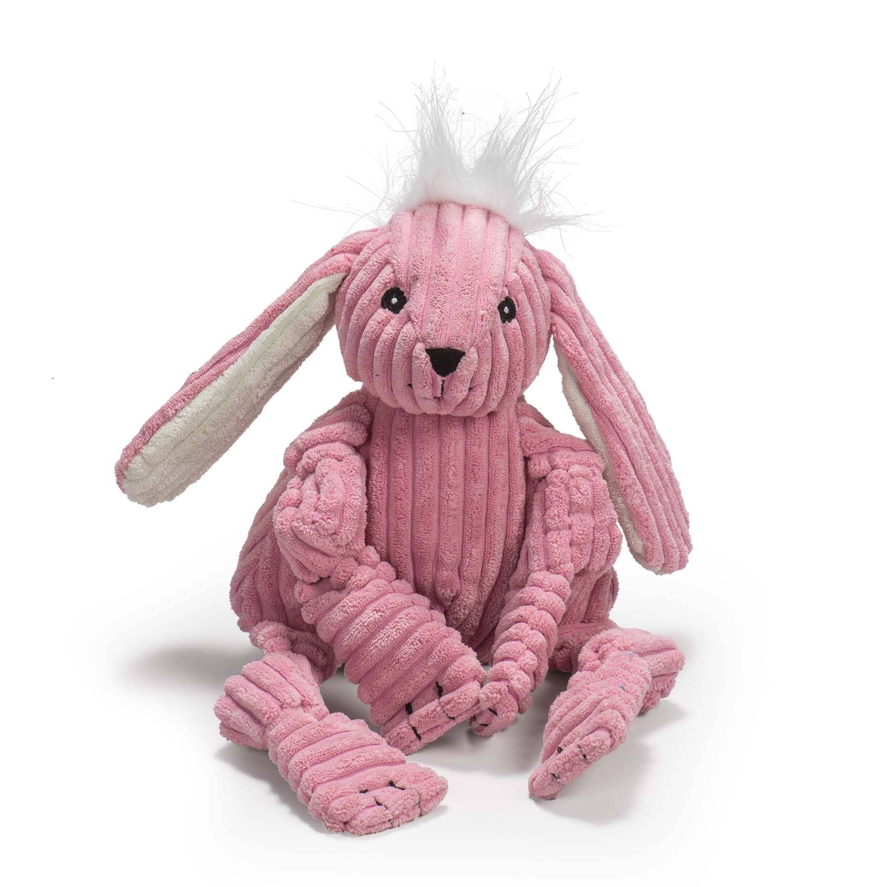 HuggleGroup Bitsy Bunny Knottie toy being carried in a dog's mouth during active play session.