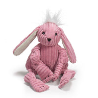 HuggleGroup Bitsy Bunny Knottie toy being carried in a dog's mouth during active play session.