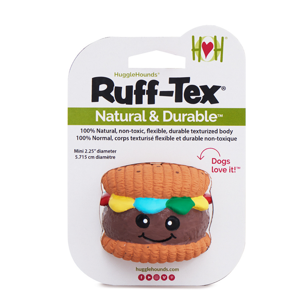 HuggleGroup Ruff-Tex Big Buns hamburger ball toy being carried by a dog outdoors during playtime.