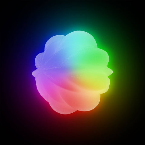 Nite Ize GlowStreak Wild LED Ball showing illuminated glow feature and durable rubber construction details.