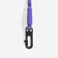 Zee.Dog Tokyo hands-free leash shown in use, highlighting its adjustable waist belt and bungee cord design.
