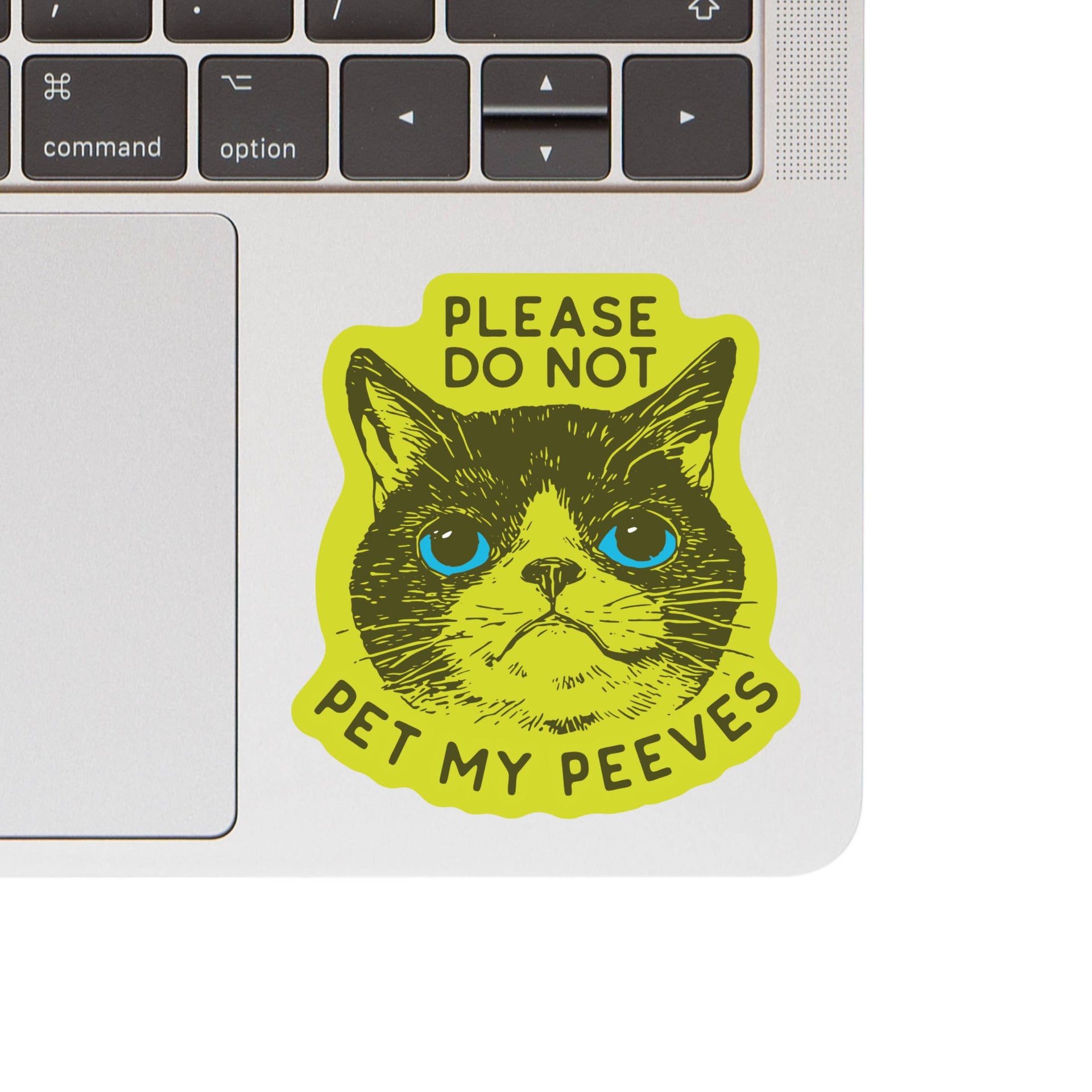 Close-up detail of Juju and Moxie My Peeves sticker showing waterproof vinyl material and humorous pet-themed design elements.