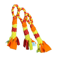 Dog playing tug-of-war with Chelsy's Toys fleece rope toy, demonstrating the product's durability and comfort.