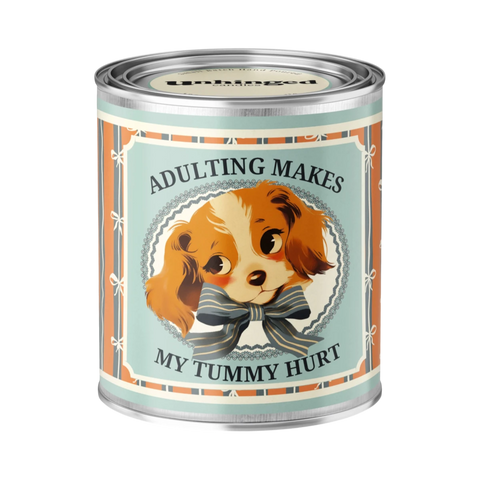 Unhinged Candles Adulting Makes My Tummy Hurt scented candle in a white jar with bold label text.