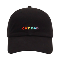 Dog Dish Cat Dad baseball cap in black cotton twill with rainbow embroidered lettering on the front