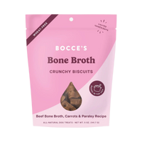 Dog Dish Bocce's Bakery wheat-free bone broth crunchy dog biscuits in a pink 5oz pouch with beef, carrot, and parsley.