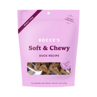 Dog Dish Bocce's Bakery soft and chewy duck dog treats in a pink 6oz wheat-free pouch with a clear window.