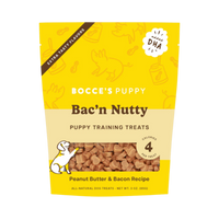 Dog Dish Bocce's Bakery Bac'n Nutty puppy training treats in a yellow 3oz bag with peanut butter and bacon flavor.