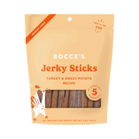 Dog Dish Bocce's Bakery Turkey and Sweet Potato jerky sticks in a 4oz wheat-free treat bag.