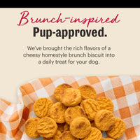 Dog Dish Honest Kitchen cheddar dog biscuits on an orange and white checkered napkin