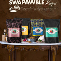 Dog Dish selection of Fromm Four-Star grain-free cat food bags featuring various gourmet recipe flavors on a table.