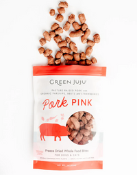 Dog Dish Green Juju Pork Pink freeze-dried dog treats with pasture-raised pork, beets, and strawberries in a bag.