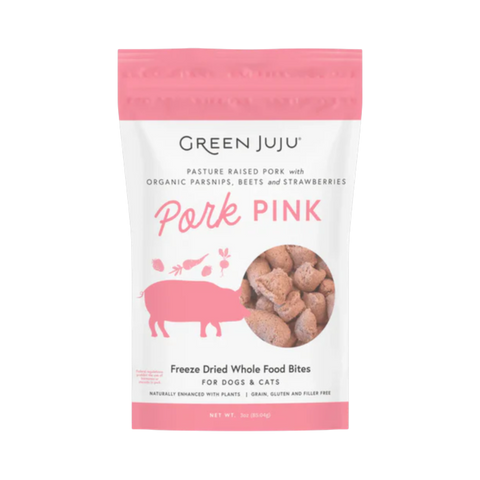 Dog Dish Green Juju Pork Pink Bites freeze-dried dog treats in a pink pouch with pork and vegetable illustrations.