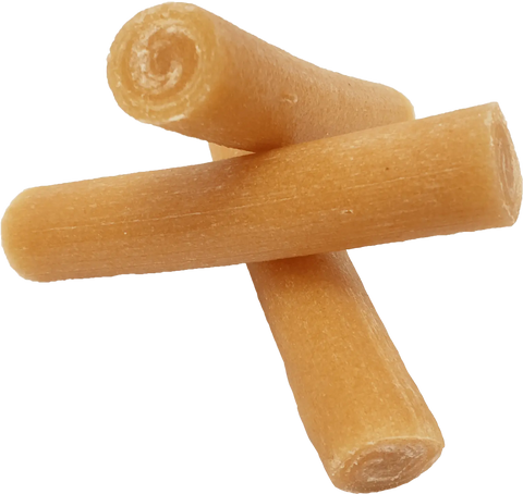 Dog Dish Himalayan Pet Yaky Yum cheese chews for dogs, featuring three cylindrical, medium-density natural treats.