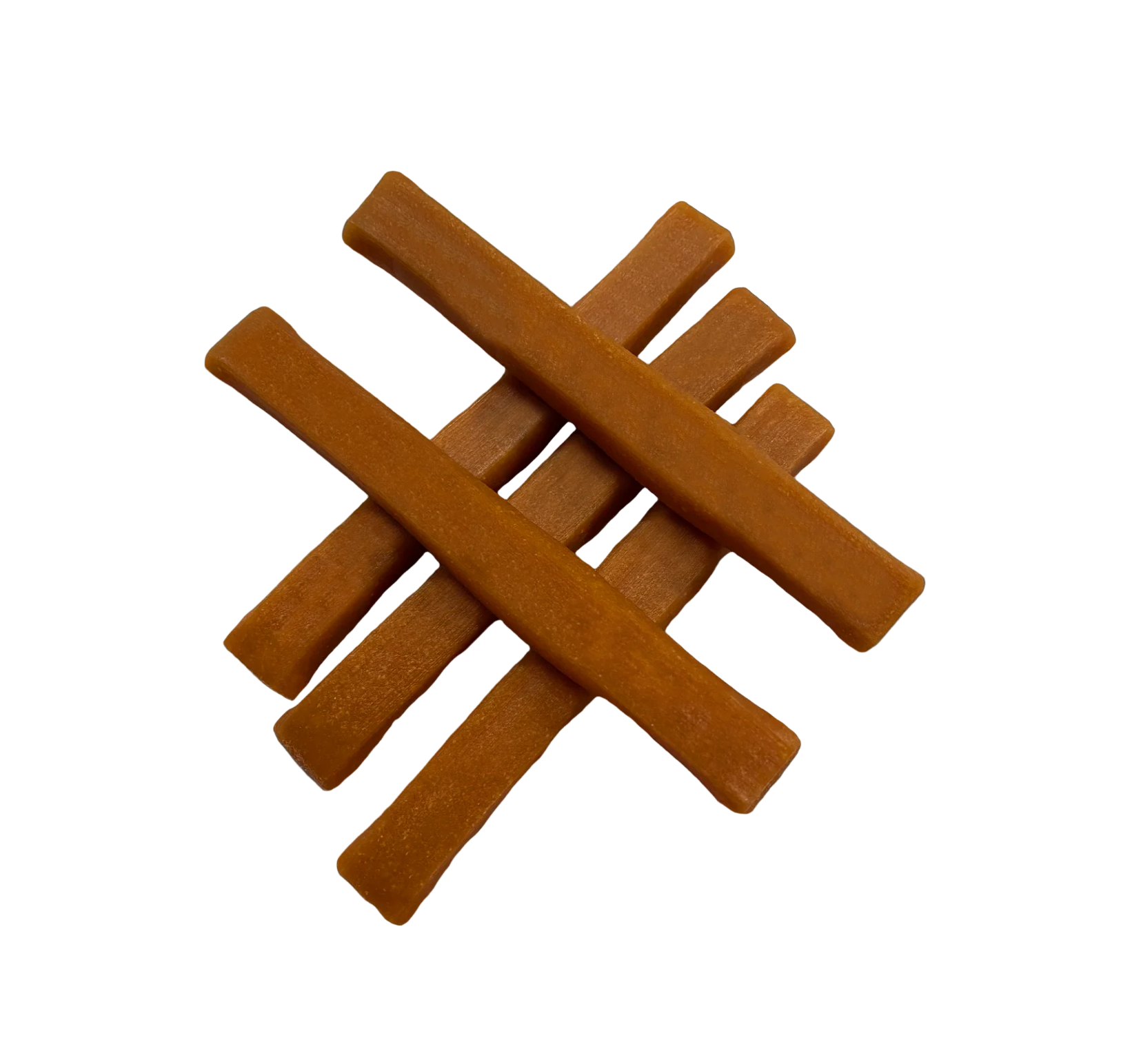 Close-up detail of Himalayan Dog Chew Yogurt Sticks in Pumpkin flavor showing treat texture and shape.