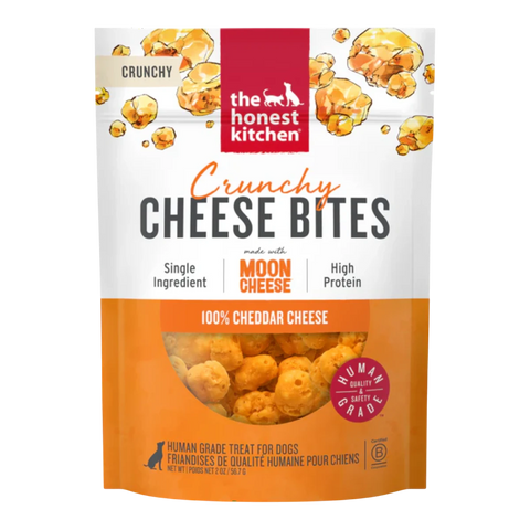 Dog Dish Honest Kitchen crunchy cheddar cheese bites for dogs in a 2oz resealable pouch with human grade ingredients.