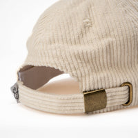 Dog Dish ivory corduroy baseball hat back view with adjustable antique brass buckle strap