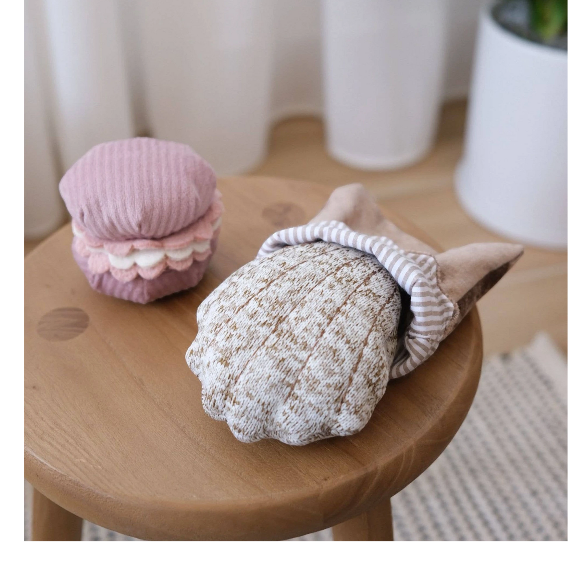Dog Dish Lambwolf Cookie enrichment set with a pink macaroon and a textured brown madeleine dog puzzle toy.