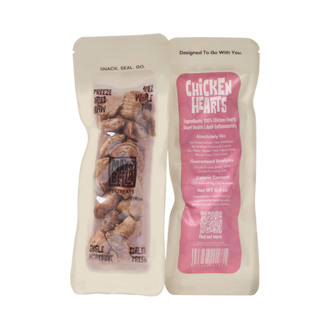 Dog Dish Max & Bella freeze-dried chicken heart pet treats in a resealable, clear-windowed, light pink pouch.