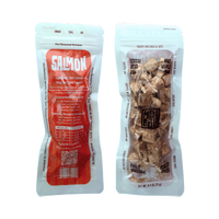 Dog Dish Max & Bella freeze-dried salmon pet treats in resealable, odor-proof pouches for dogs and cats.
