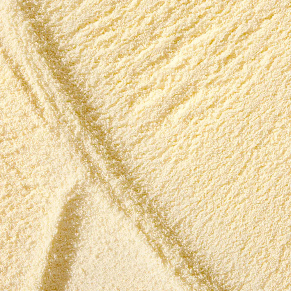 Dog Dish Native Pet bovine colostrum immune system powder with a fine, pale yellow texture for dog health support.