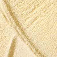 Dog Dish Native Pet bovine colostrum immune system powder with a fine, pale yellow texture for dog health support.