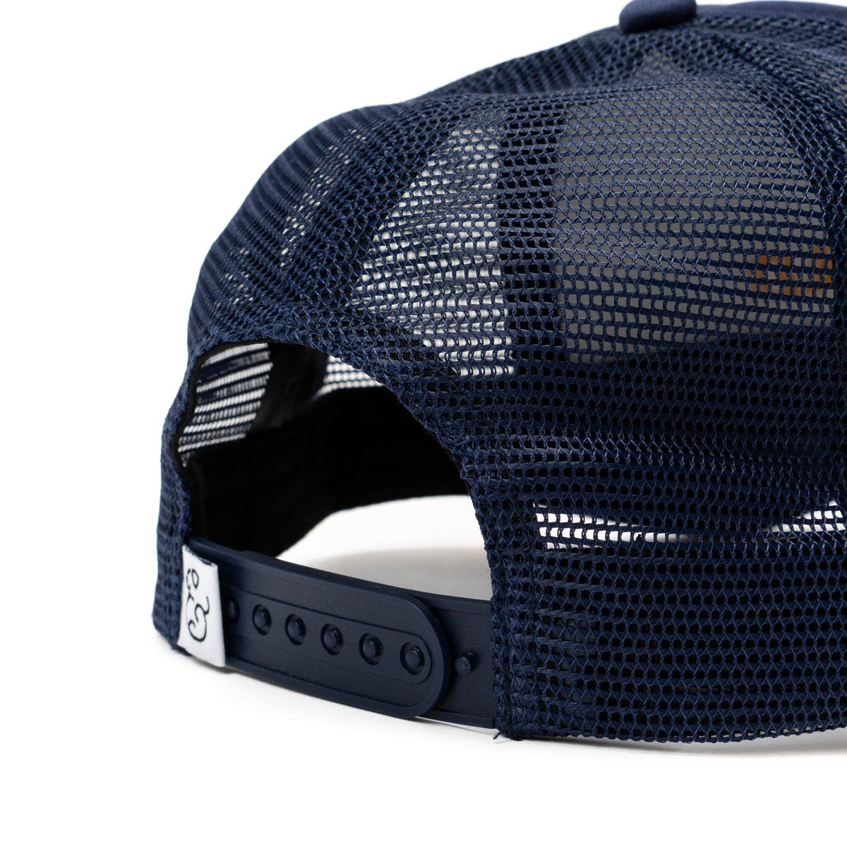 Dog Dish navy trucker hat with breathable mesh back and adjustable snapback closure