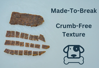 Dog Dish Saint Rocco's Treats Beef & Pumpkin jerky bar broken into small training pieces on a white surface