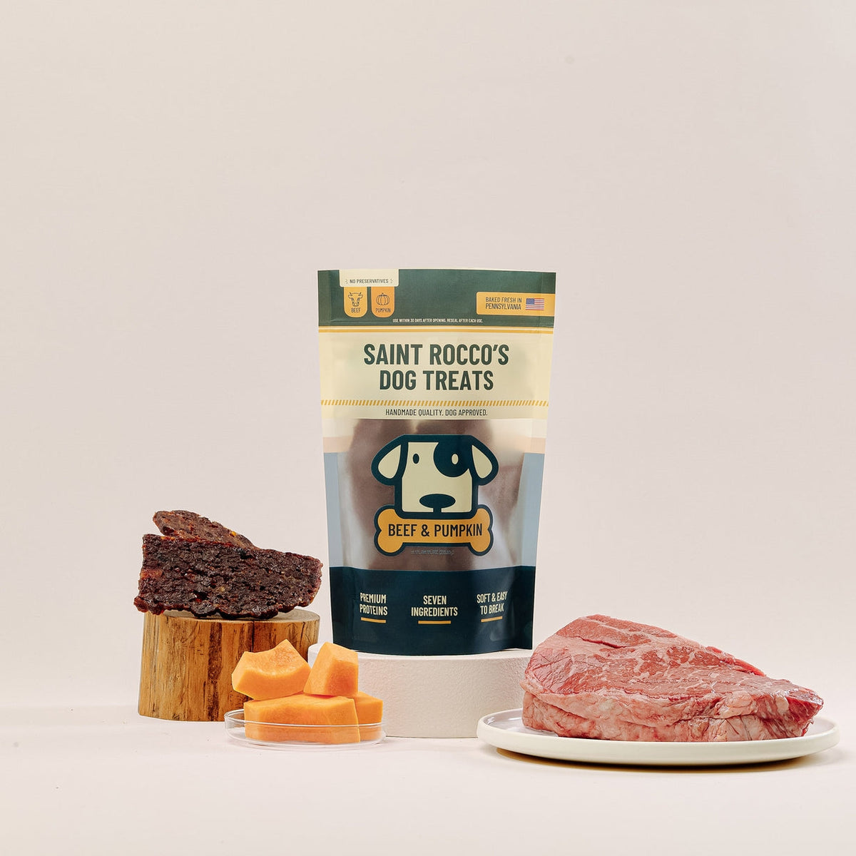 Dog Dish Saint Rocco's Treats Beef and Pumpkin jerky bars with fresh beef and pumpkin pieces on a neutral background