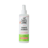 Dog Dish Skout's Honor probiotic coconut deodorizer spray for pets in a white bottle with a pump dispenser.