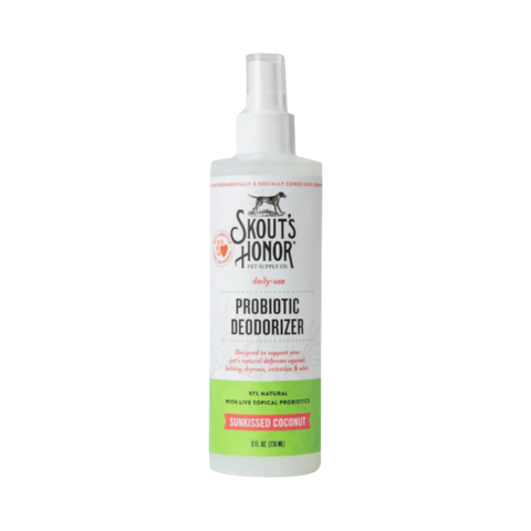 Dog Dish Skout's Honor probiotic coconut deodorizer spray for pets in a white bottle with a pump dispenser.