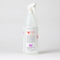 Dog Dish Skout's Honor cat litter box deodorizer spray bottle with a white label on a plain background.