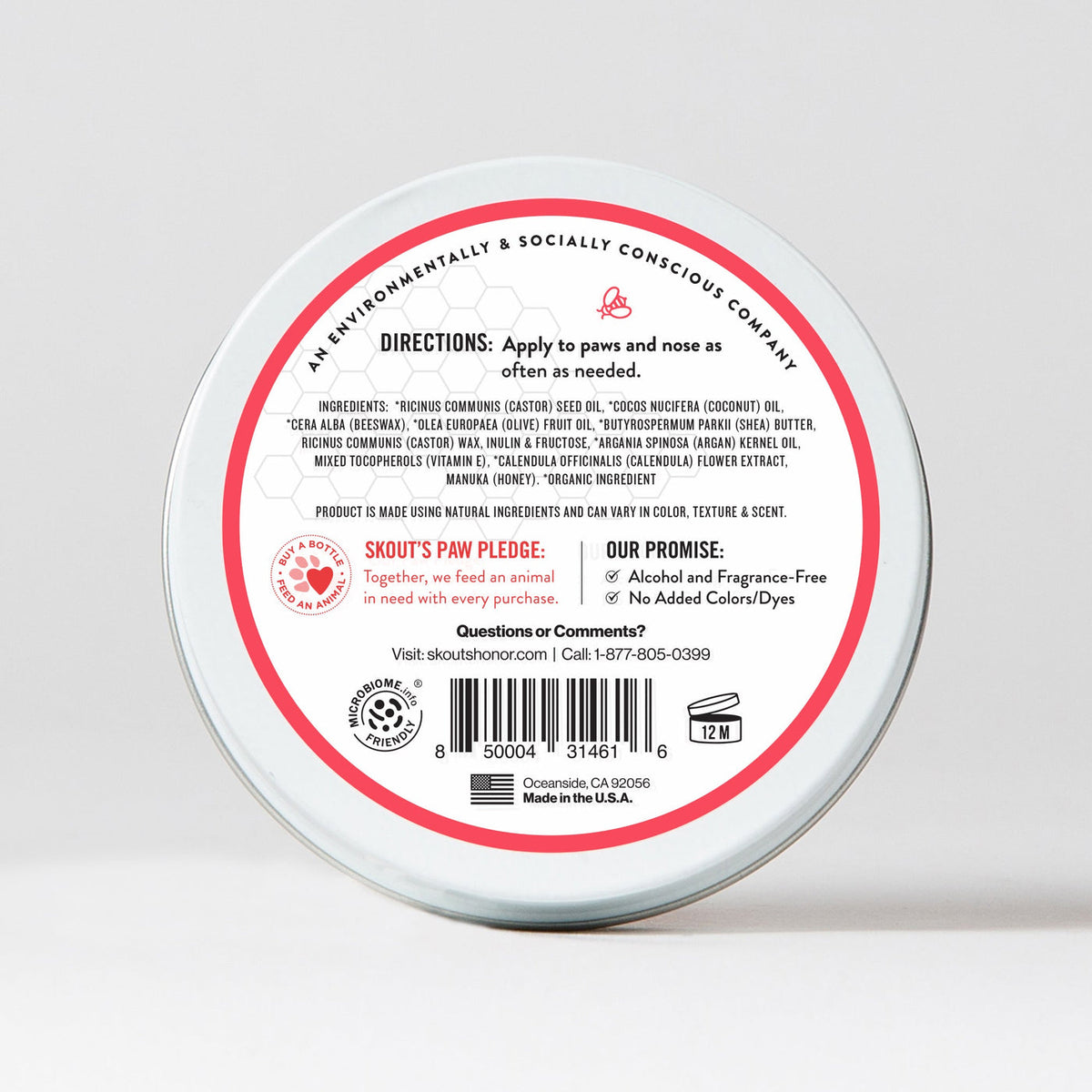 Dog Dish Skouts Honor Prebiotic Pet Balm tin showing ingredients and usage directions on the back label
