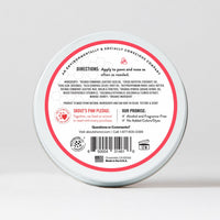 Dog Dish Skouts Honor Prebiotic Pet Balm tin showing ingredients and usage directions on the back label