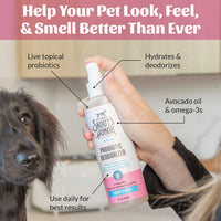 Dog Dish Skout's Honor Happy Puppy probiotic deodorizer spray bottle held by a person next to a black dog