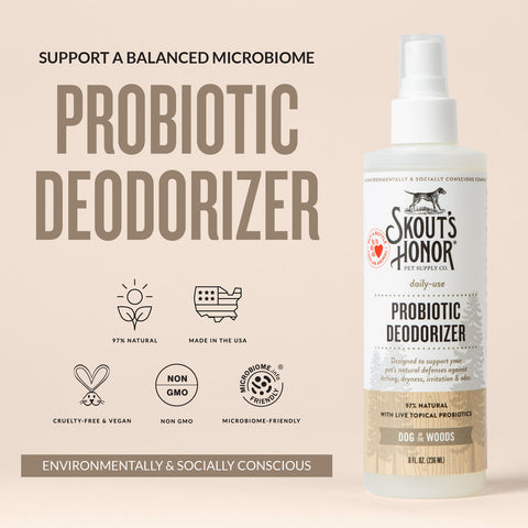 Dog Dish Skout's Honor Probiotic Deodorizer spray for dogs in a white bottle with Dog of the Woods scent label