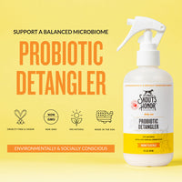 Dog Dish Skout's Honor probiotic honeysuckle detangler spray bottle for pet grooming on a yellow background.